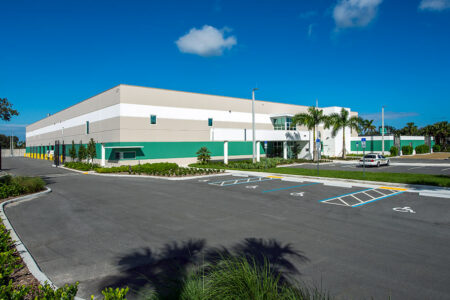 exterior of evidence facility with parking lot in front